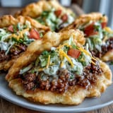Fluffy cloud bread tacos filled with savory seasoned beef, perfect for low-carb enjoyment.