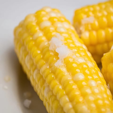 Perfectly grilled summer corn on the cob, lightly charred and smoky, brushed with creamy butter and ready to be enjoyed with dinner.
