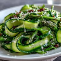 Vibrant shaved asparagus salad with lemon and Parmesan, a fresh and elegant spring side dish.
