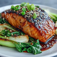 Miso Glazed Salmon with vibrant sesame bok choy, a delicious Asian-inspired meal.